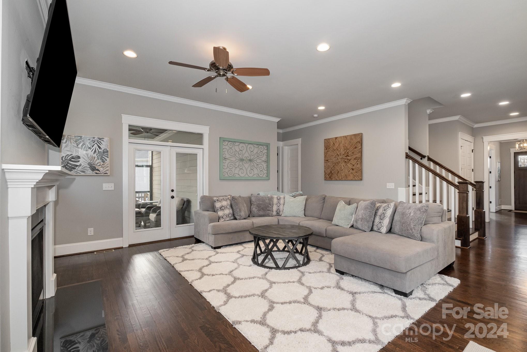 2289 Tatton Hall Road Fort Mill, SC 29715 - Photo 11 of 48 a living room with furniture and a flat screen tv
