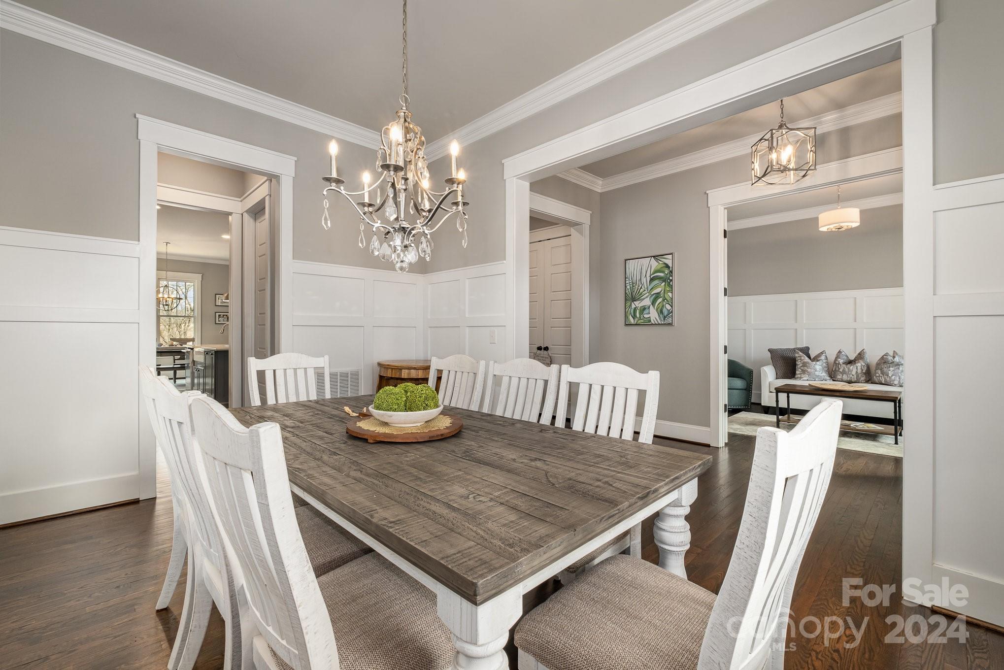 2289 Tatton Hall Road Fort Mill, SC 29715 - Photo 13 of 48 a view of a dining room with furniture and wooden floor