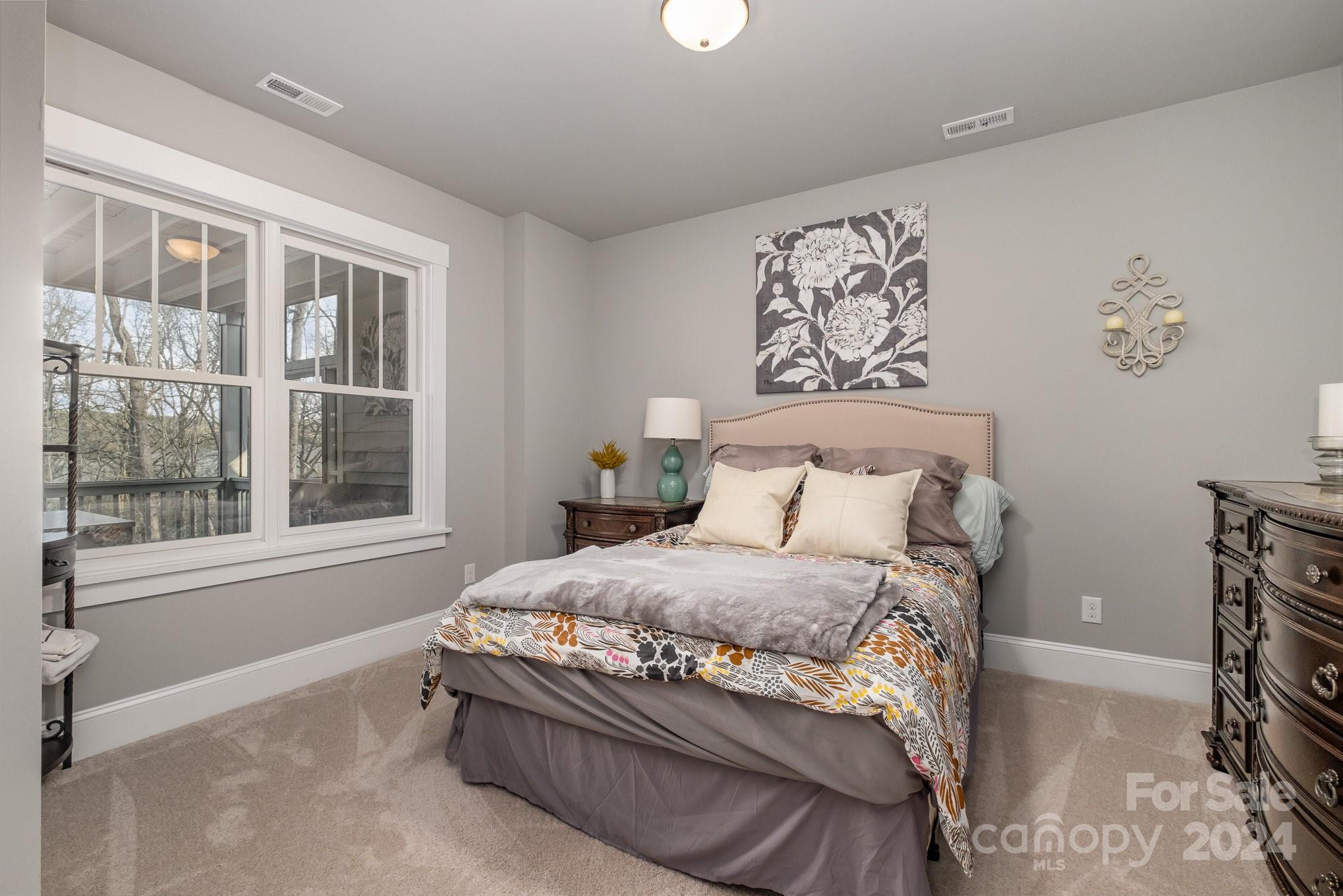 2289 Tatton Hall Road Fort Mill, SC 29715 - Photo 18 of 48 a bedroom with a bed and a window