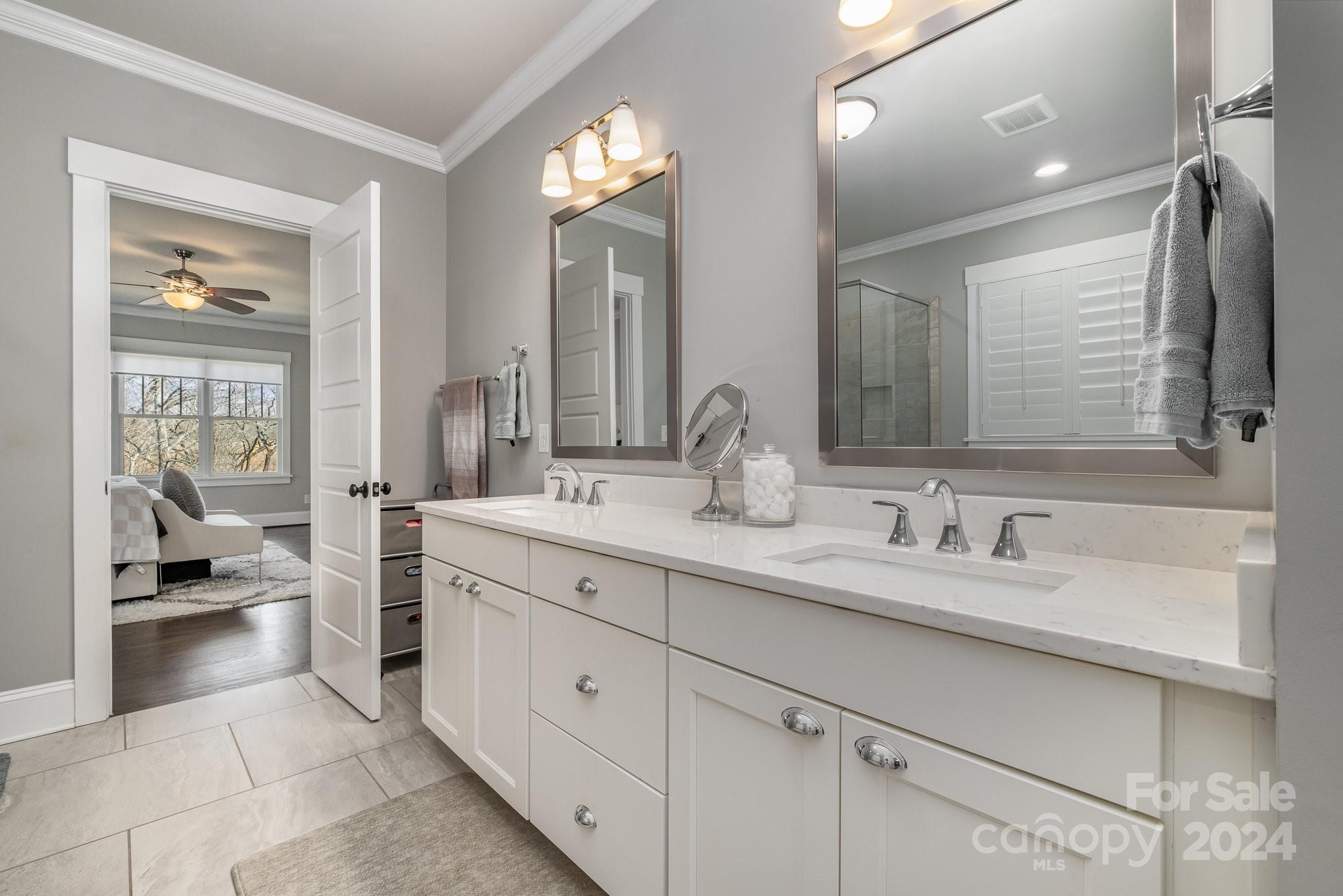 2289 Tatton Hall Road Fort Mill, SC 29715 - Photo 24 of 48 a en suite bathroom with double sink and a large mirror