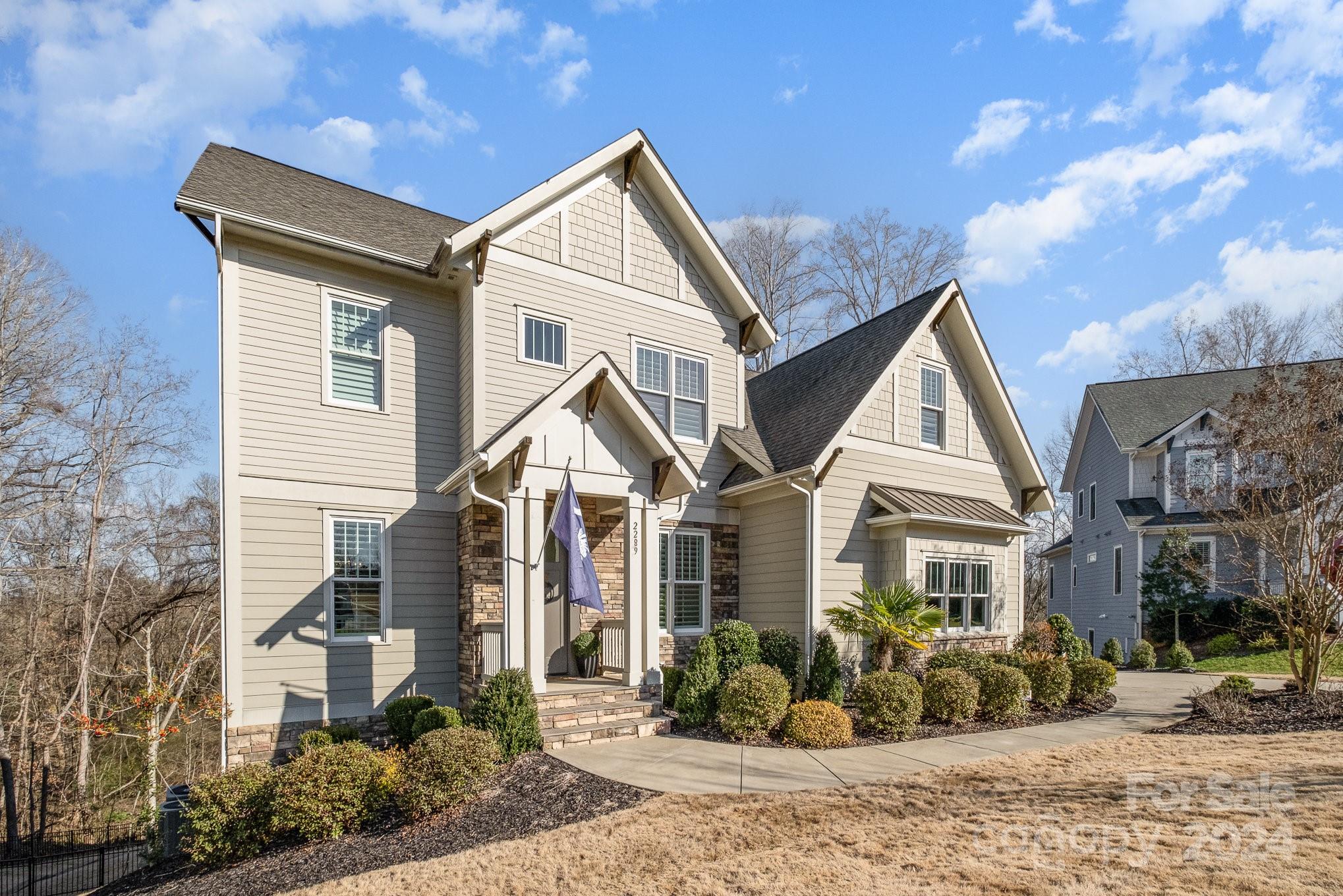 2289 Tatton Hall Road Fort Mill, SC 29715 - Photo 3 of 48 a front view of a house with a yard