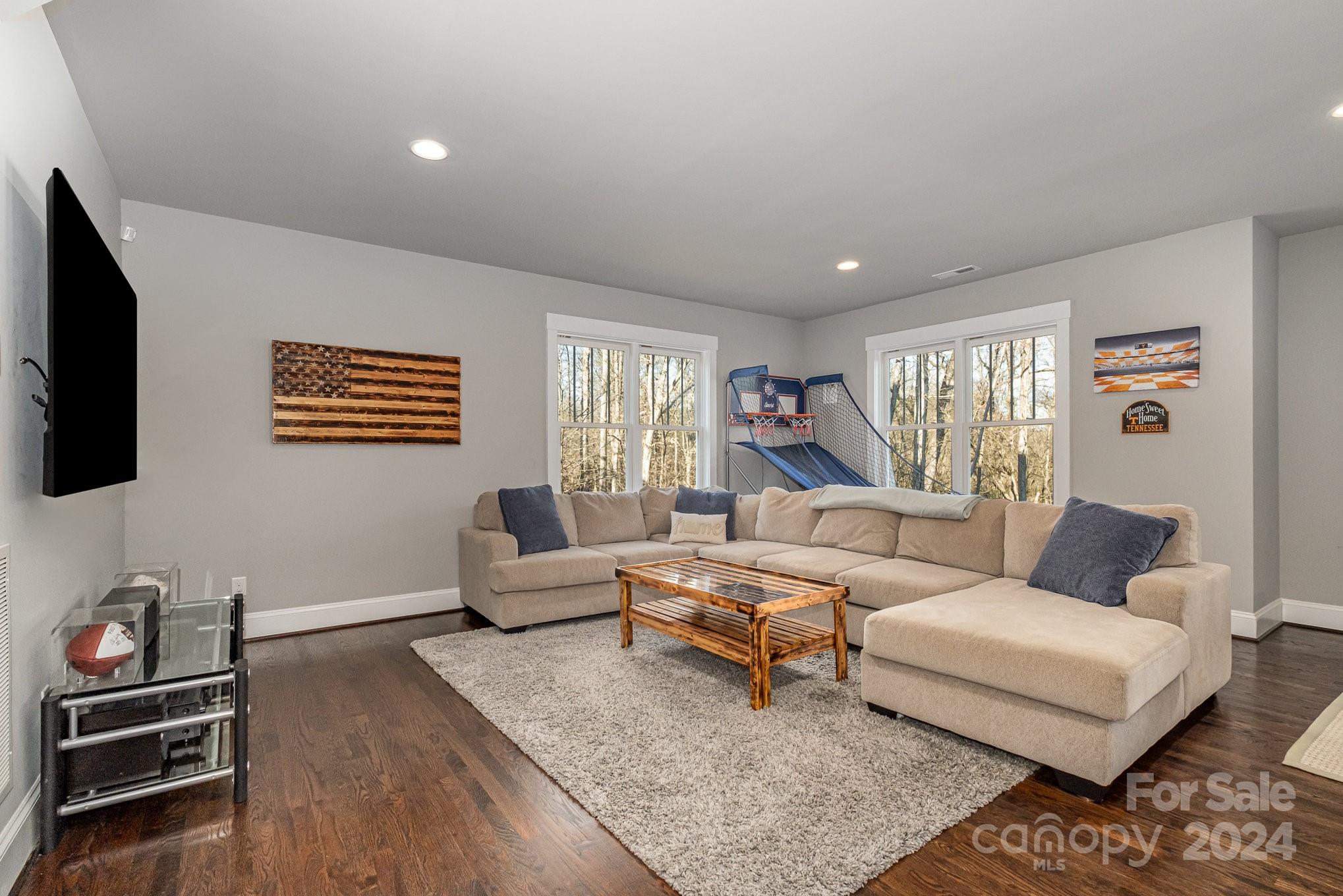 2289 Tatton Hall Road Fort Mill, SC 29715 - Photo 35 of 48 a living room with furniture and a flat screen tv