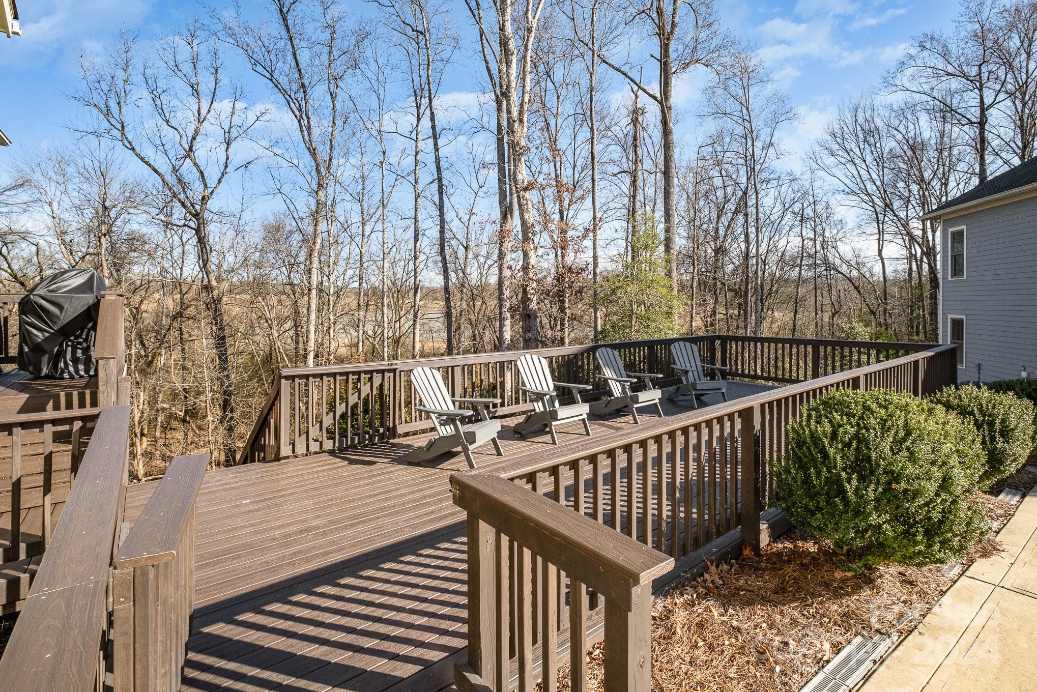 2289 Tatton Hall Road Fort Mill, SC 29715 - Photo 39 of 48 a view of balcony with wooden floor and outdoor seating