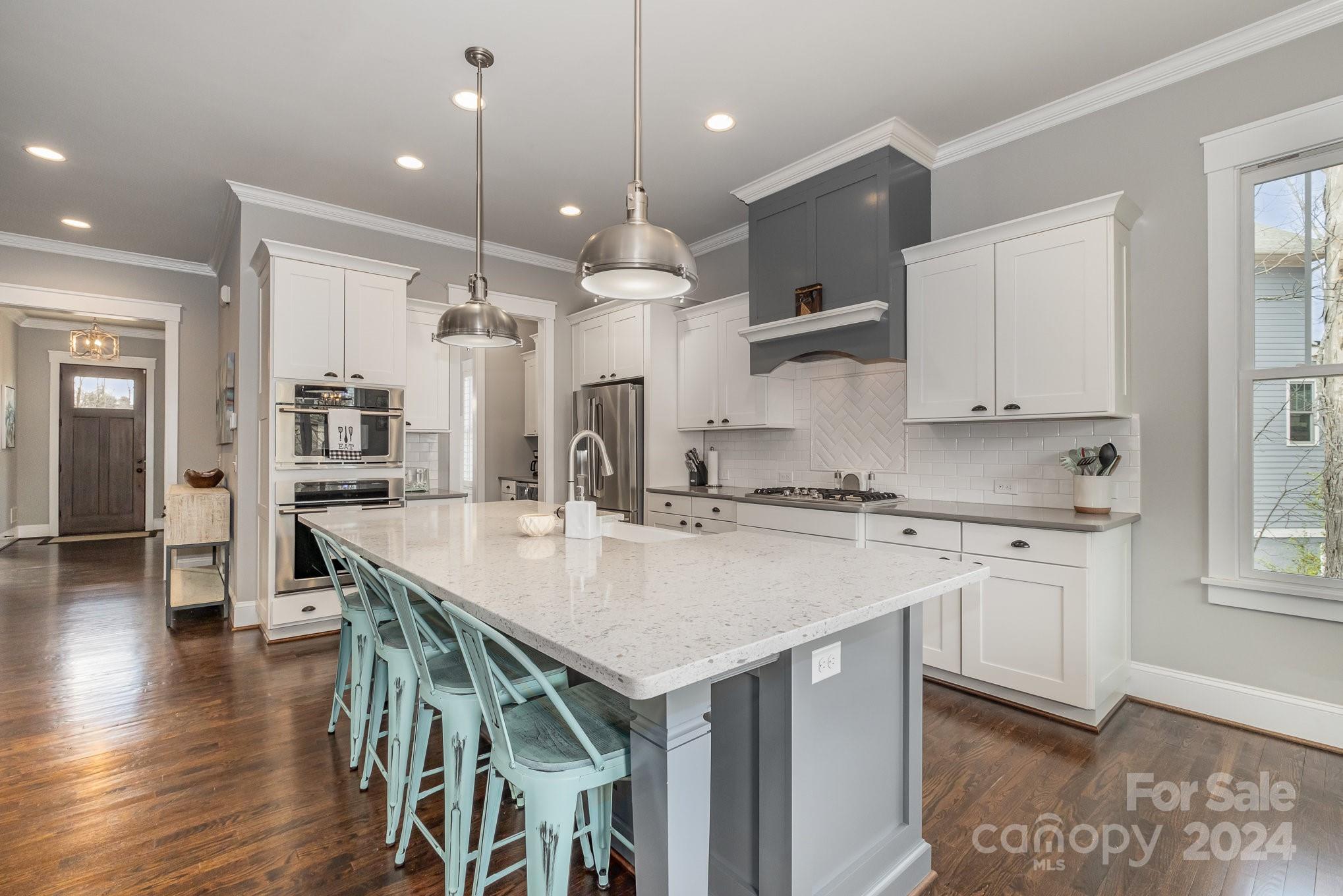 2289 Tatton Hall Road Fort Mill, SC 29715 - Photo 7 of 48 a kitchen with a center island appliances and cabinets