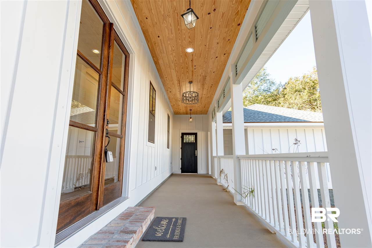 389 Pecan Avenue Fairhope, AL 36532 - Photo 2 of 50 Custom made porch DOOR...wood detailing