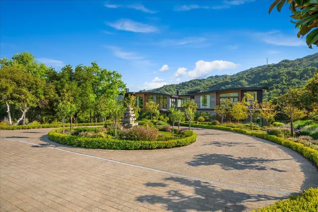 a outdoor dining space with furniture and garden view
