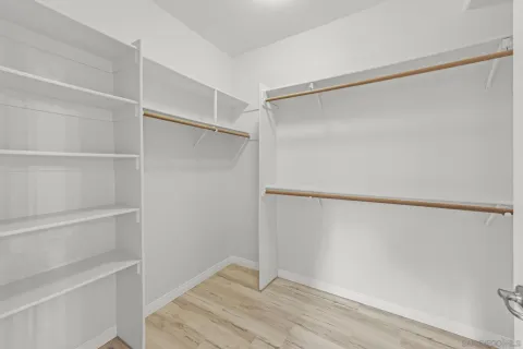 a view of an empty walk in closet
