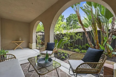 a living room with a couch and a large window