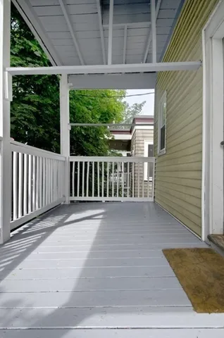 a view of a balcony with a swing