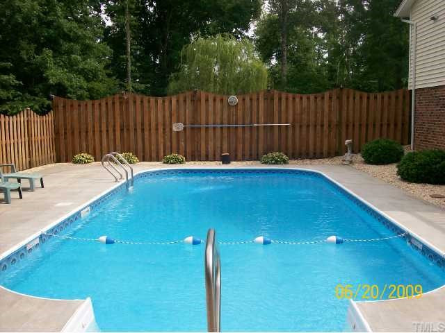 5031 Preacher Holmes Road Graham, NC 27253 - Photo 10 of 12 Beautiful 16x32 Inground Pool w/ Dolphin Fountain, Patio, and Privacy Fence .