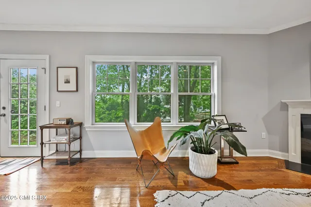a dining room with a table and chairs