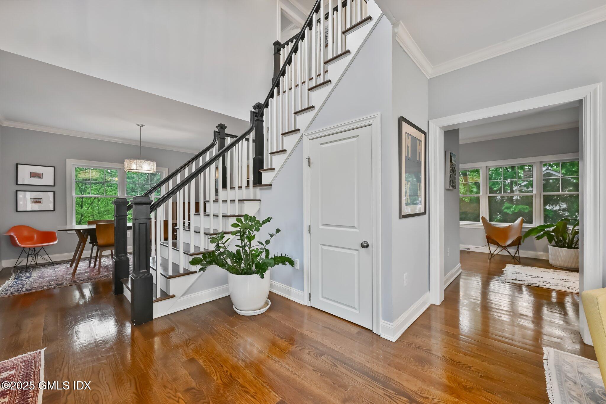 8 View Street, Unit 10 Greenwich, CT 06830 - Photo 4 of 26 a view of entryway and hall with wooden floor