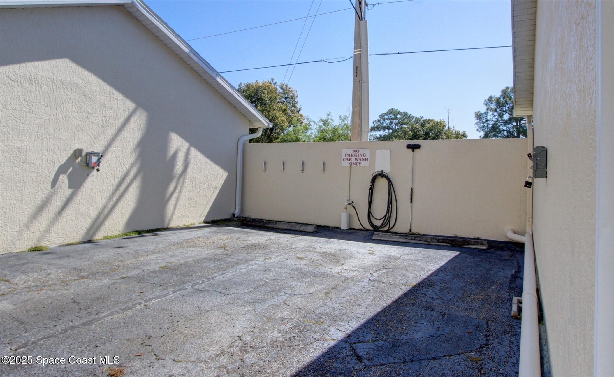 1420 Huntington Lane, Unit 2105 Rockledge, FL 32955 - Photo 24 of 24 a view of a utility room with a sink