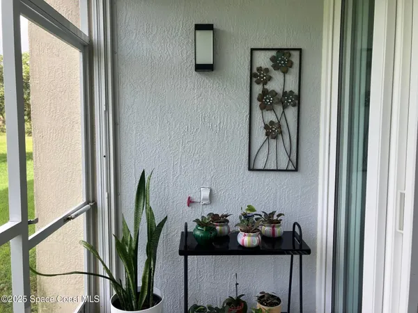 a table with a vase of flowers on it