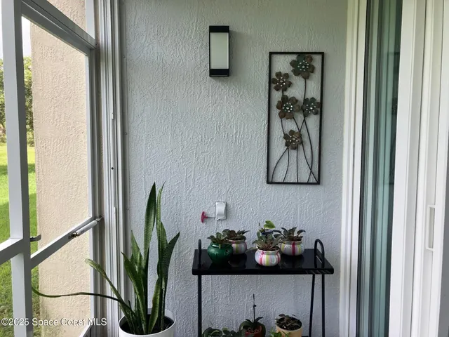 a table with a vase of flowers on it