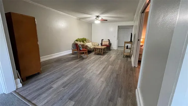a bedroom with two beds and a chandelier