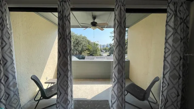 a bedroom with a bed and a walk in closet