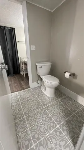 a view of balcony with wooden floor