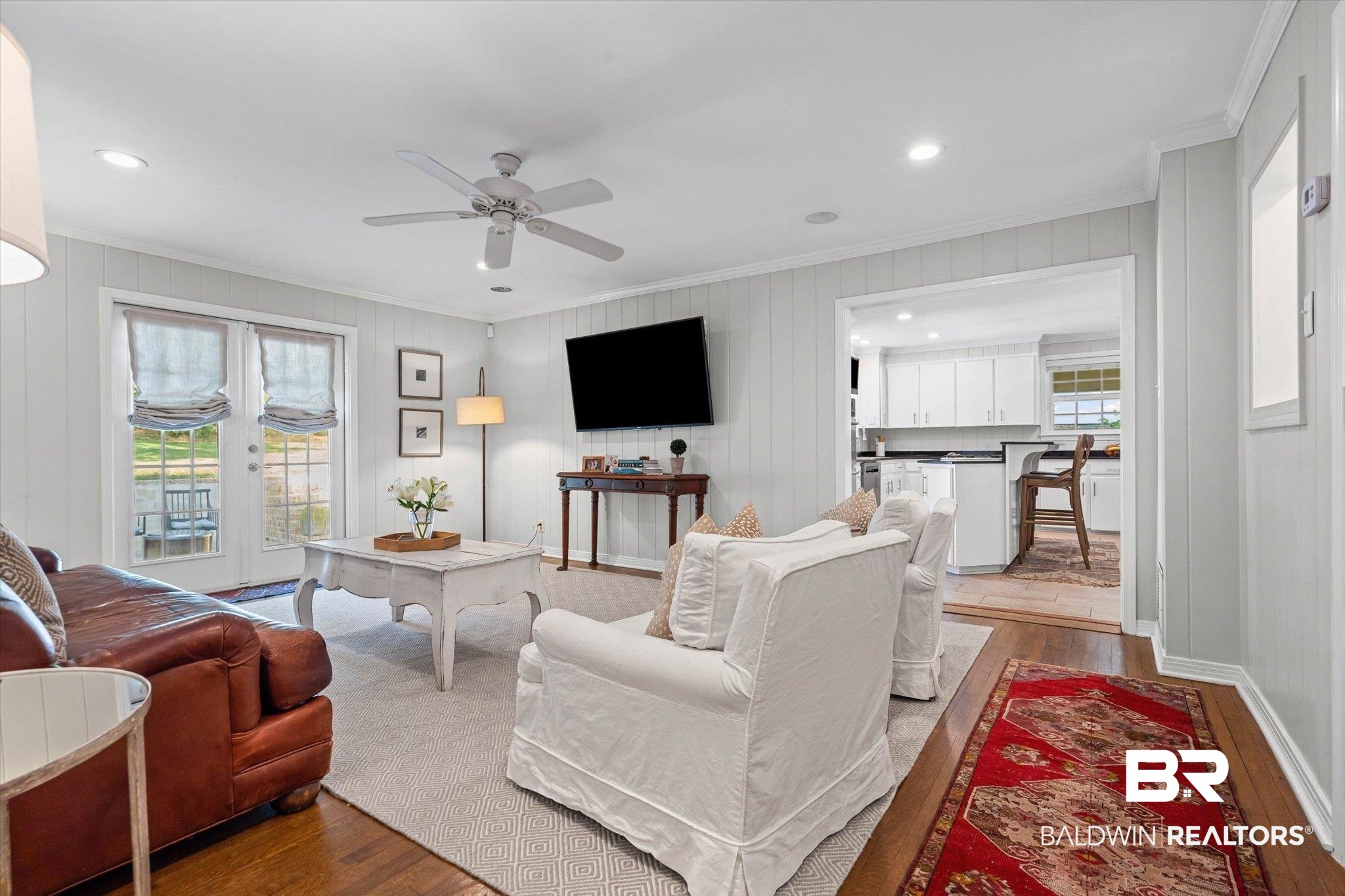 313 Brawood Drive Mobile, AL 36608 - Photo 12 of 32 Living area featuring dark wood-type flooring, ornamental molding, recessed lighting, and a ceiling fan