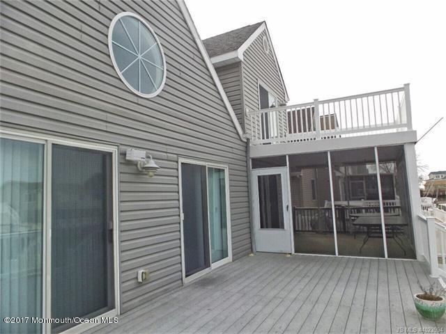 36 Diane Road Manahawkin, NJ 08050 - Photo 27 of 28 a front view of a house with balcony