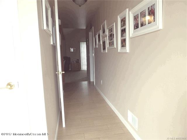 36 Diane Road Manahawkin, NJ 08050 - Photo 6 of 28 a view of a hallway with seating area