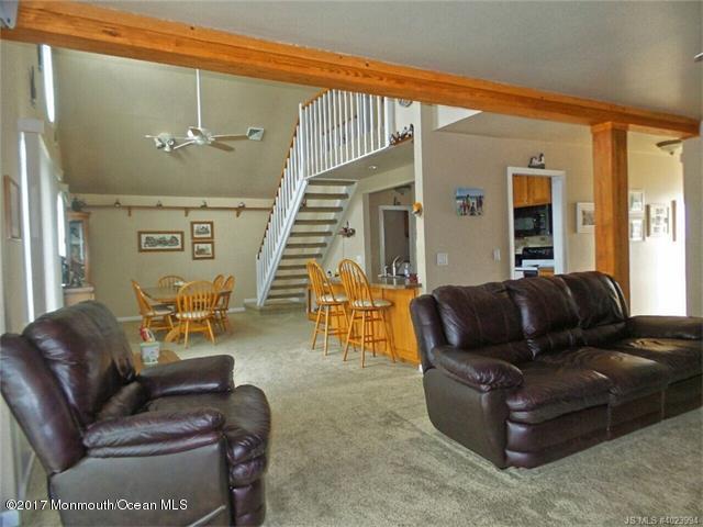 36 Diane Road Manahawkin, NJ 08050 - Photo 10 of 28 a living room with furniture and wooden floor