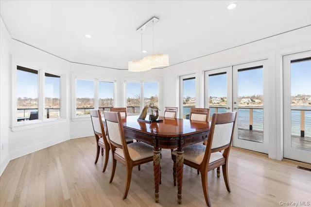 a spacious bedroom with a bed and a large window