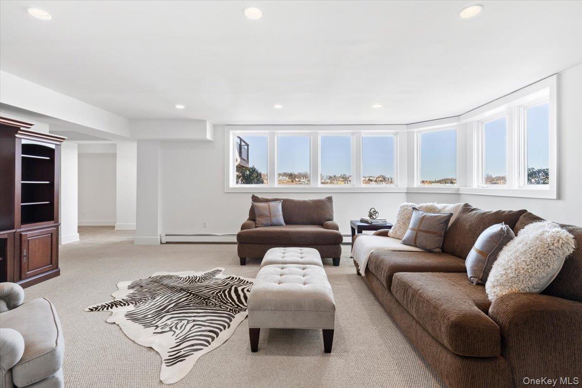 6 North Island Drive Rye, NY 10580 - Photo 25 of 34 a living room with furniture and a window