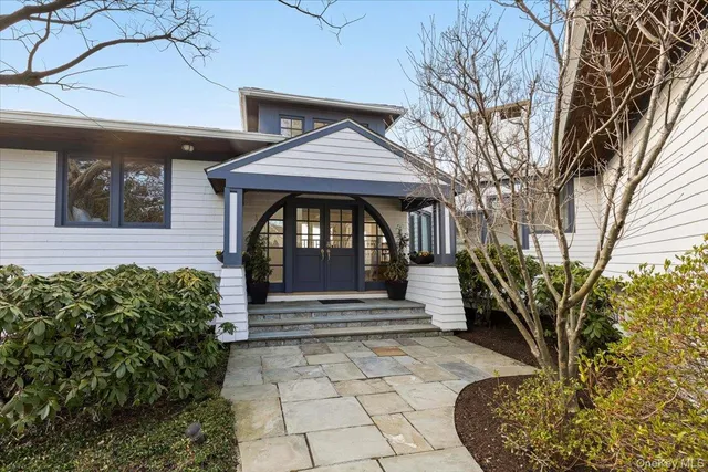 a view of a house with a small porch