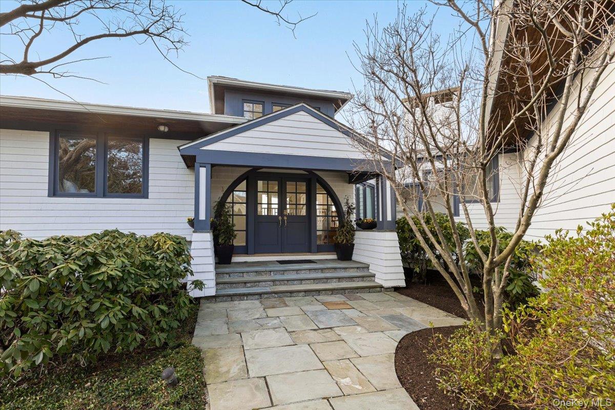 6 North Island Drive Rye, NY 10580 - Photo 8 of 34 a view of a house with a small porch