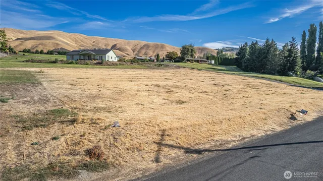 a view of lake with mountain