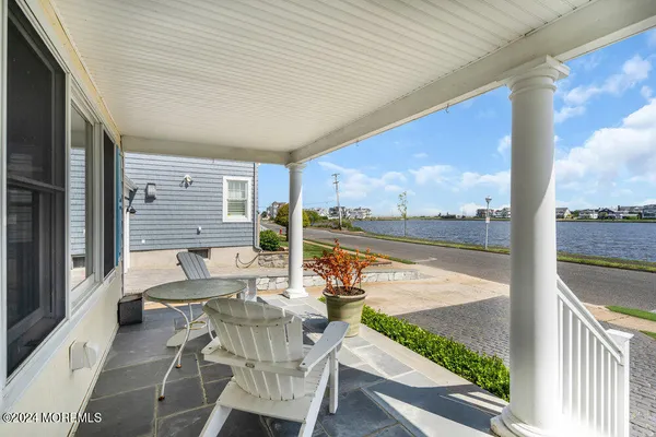 a view of swimming pool with patio