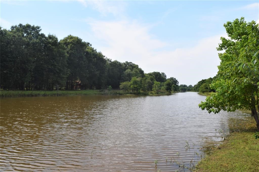 478 Center Drive Cleveland, TX 77327 - Photo 10 of 33 Lake in front of the lot