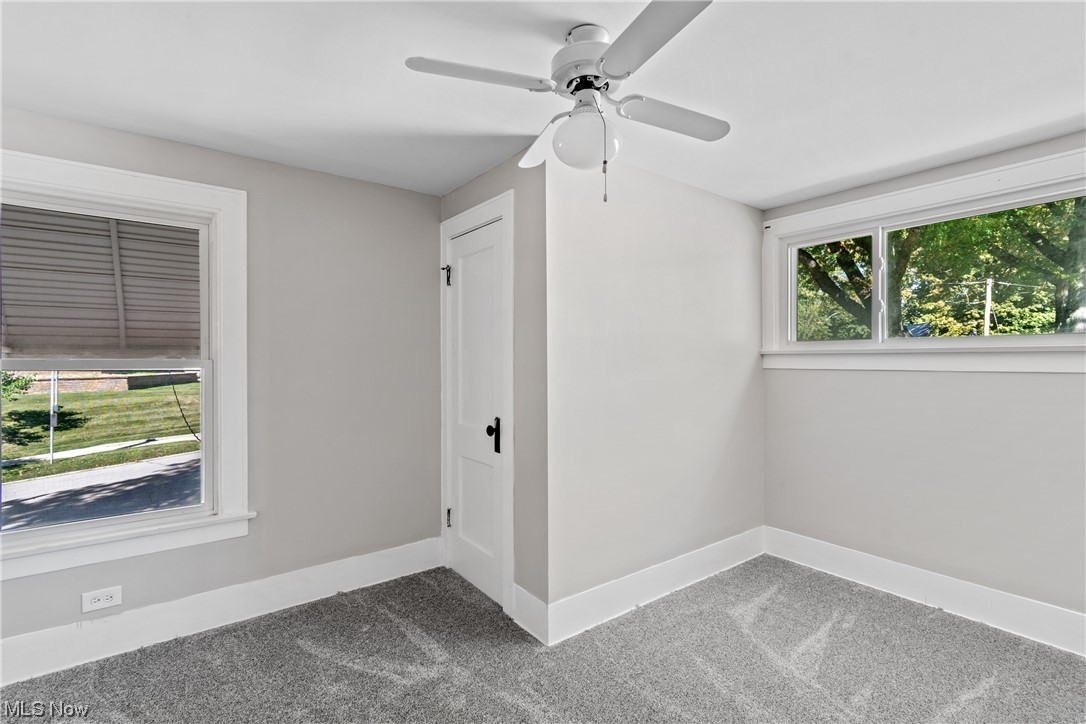 1111 Riverside Drive Akron, OH 44310 - Photo 20 of 31 Spare room with ceiling fan and carpet