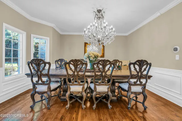a view of kitchen dining table and chairs
