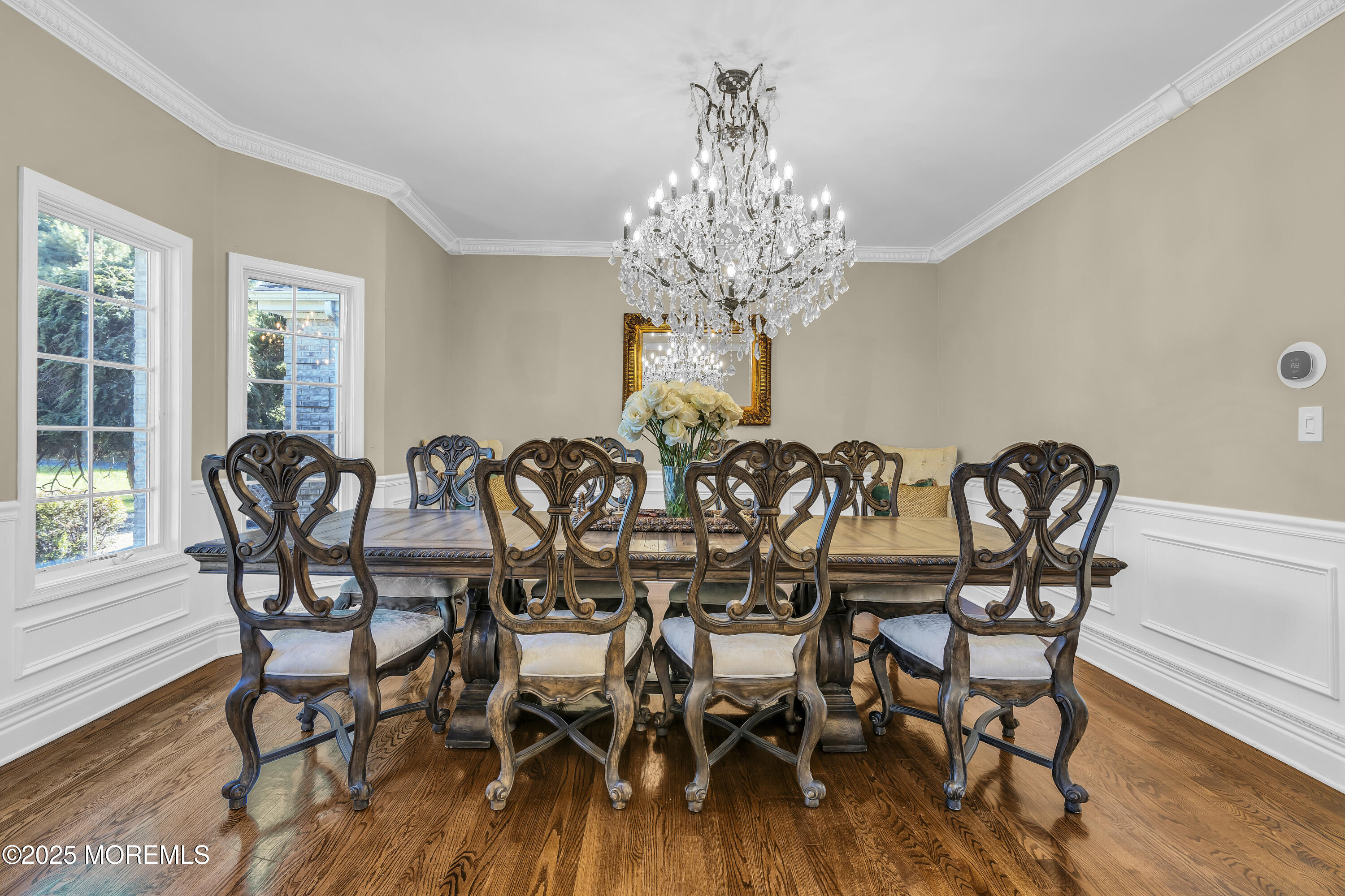 1 Fountayne Lane Manalapan, NJ 07726 - Photo 15 of 69 a view of a dining room with furniture wooden floor and chandelier