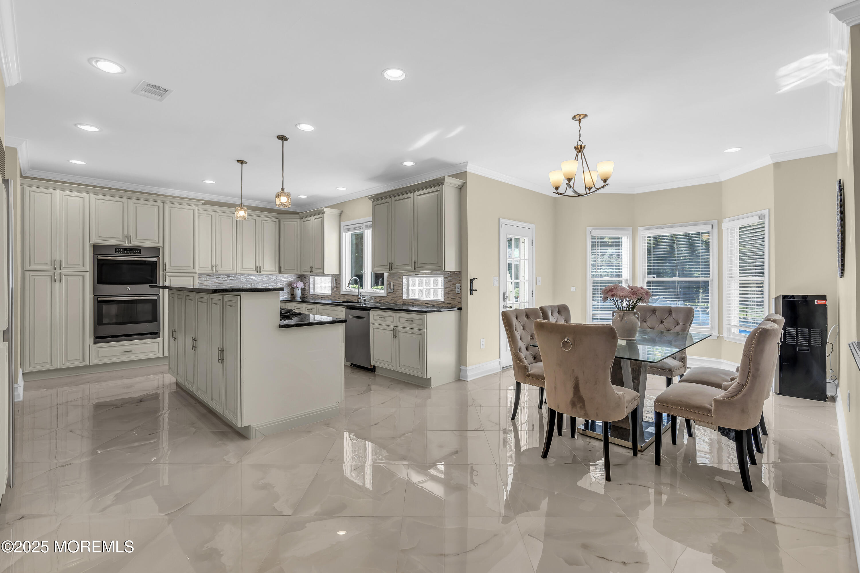 1 Fountayne Lane Manalapan, NJ 07726 - Photo 19 of 69 a view of kitchen dining table and chairs