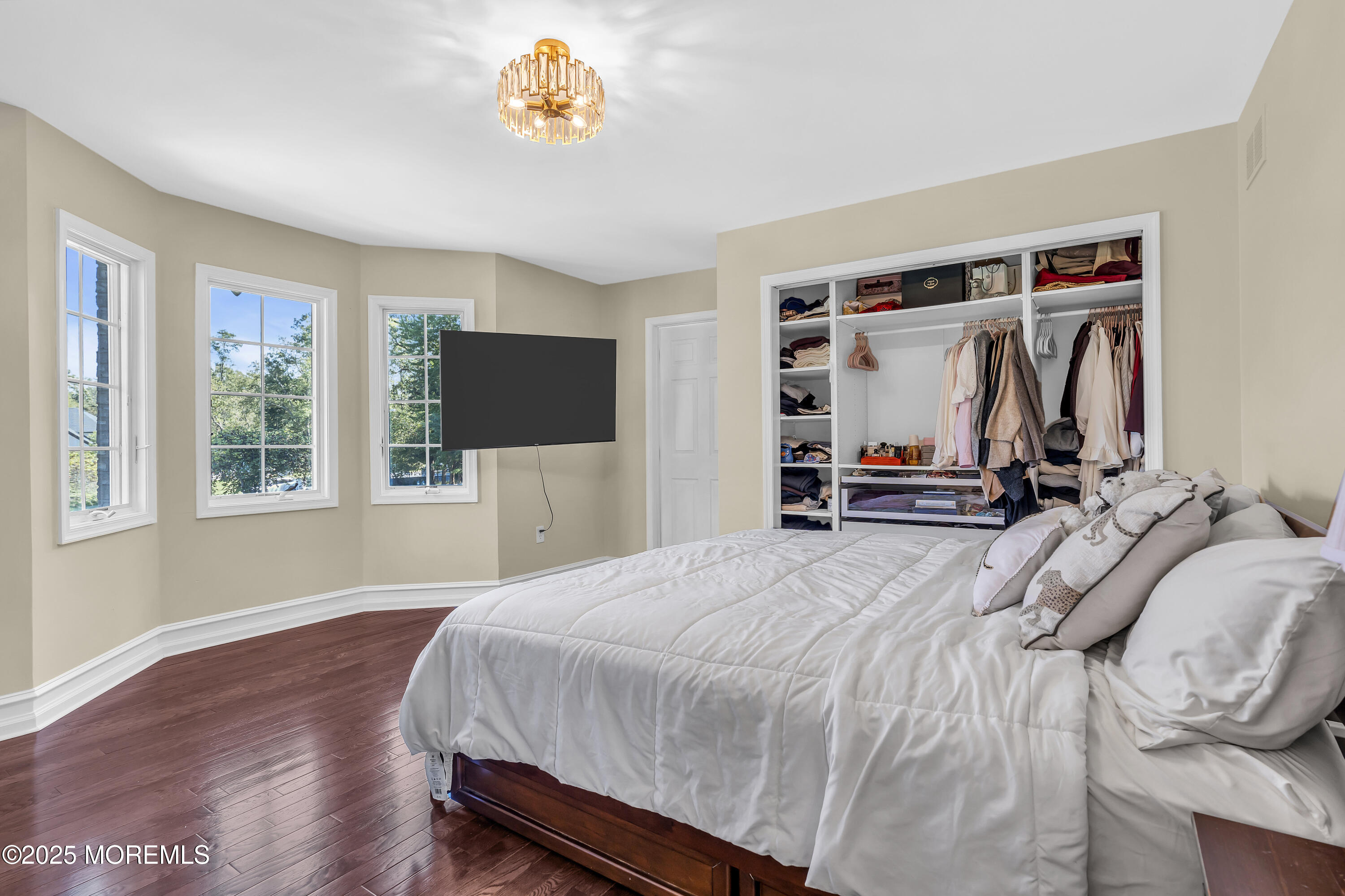 1 Fountayne Lane Manalapan, NJ 07726 - Photo 34 of 69 a bedroom with a bed and a flat screen tv