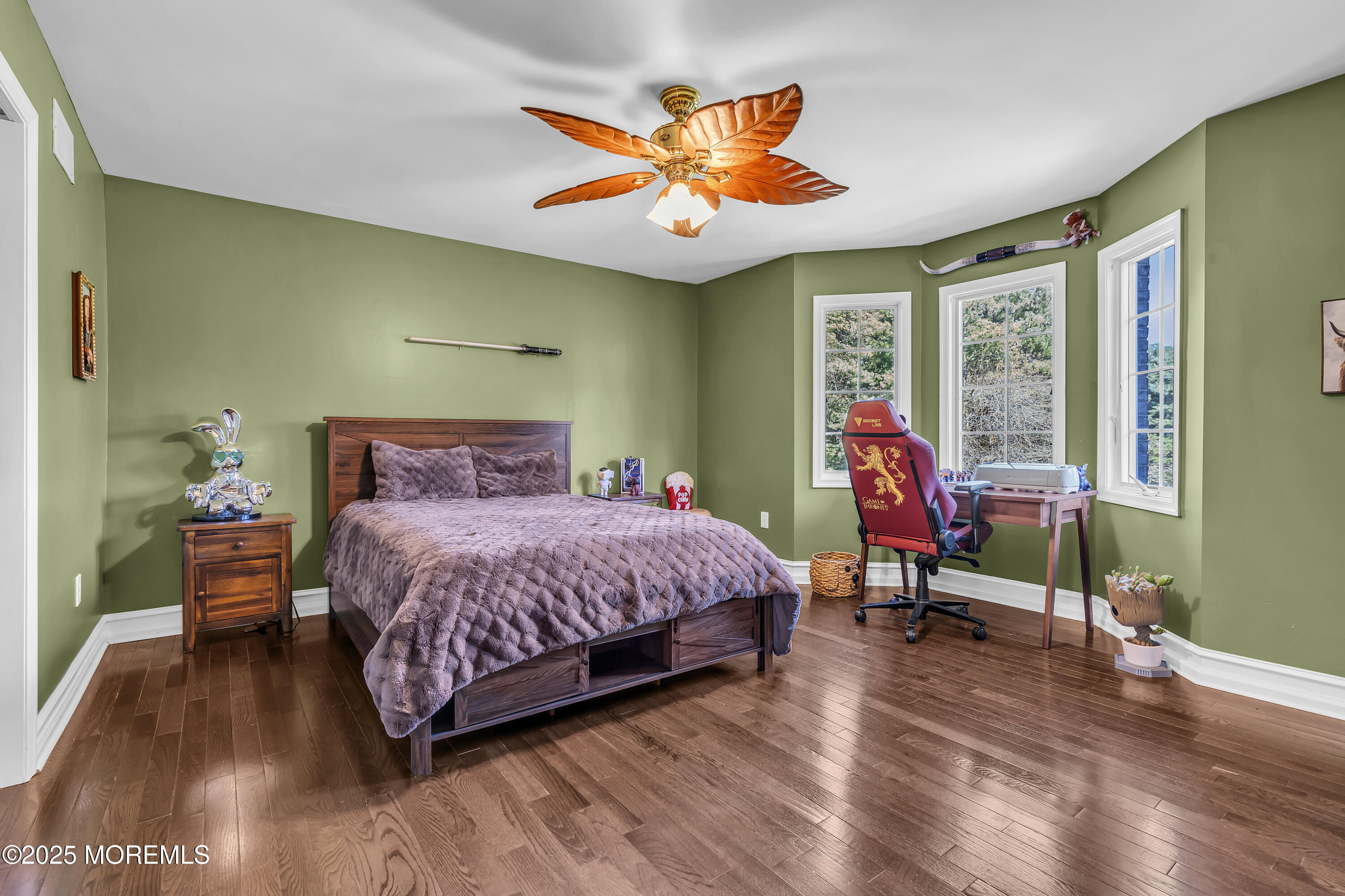 1 Fountayne Lane Manalapan, NJ 07726 - Photo 37 of 69 a bedroom with a bed and wooden floor