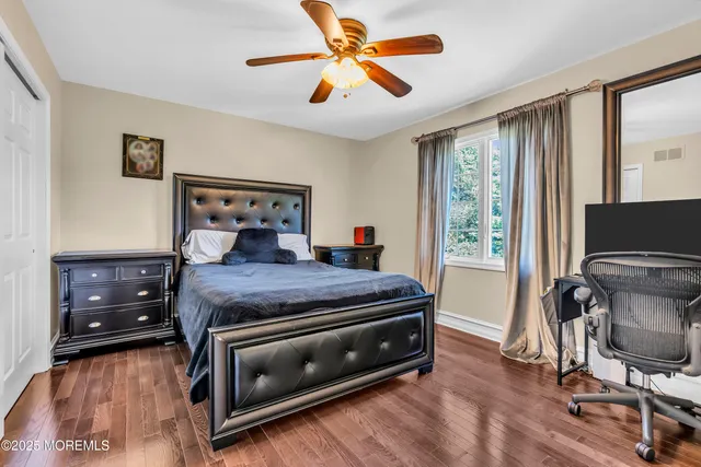 a bathroom with a granite countertop sink mirror and double