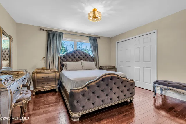 a bathroom with a tub and a window