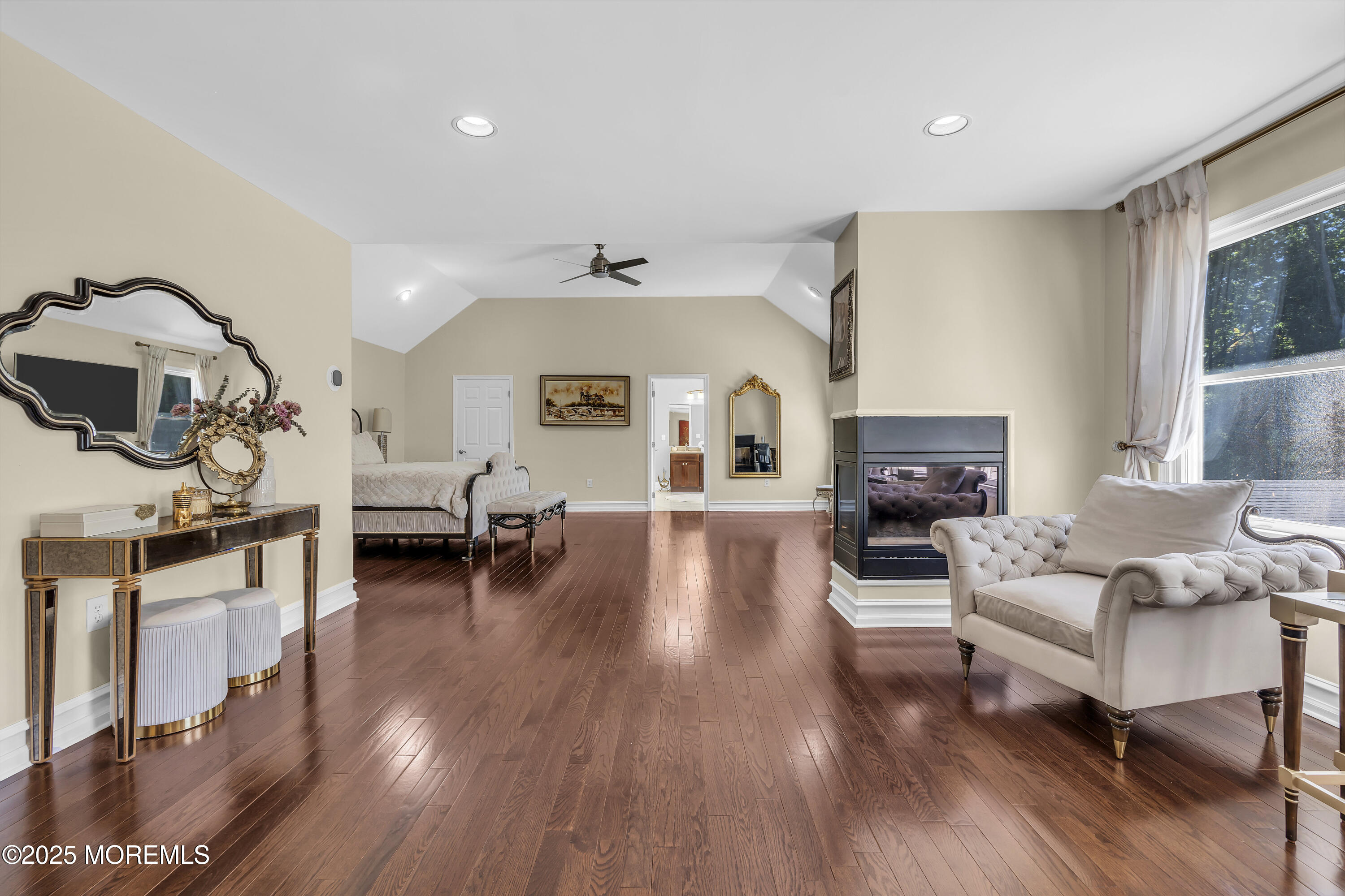 1 Fountayne Lane Manalapan, NJ 07726 - Photo 43 of 69 a living room with furniture and a fireplace