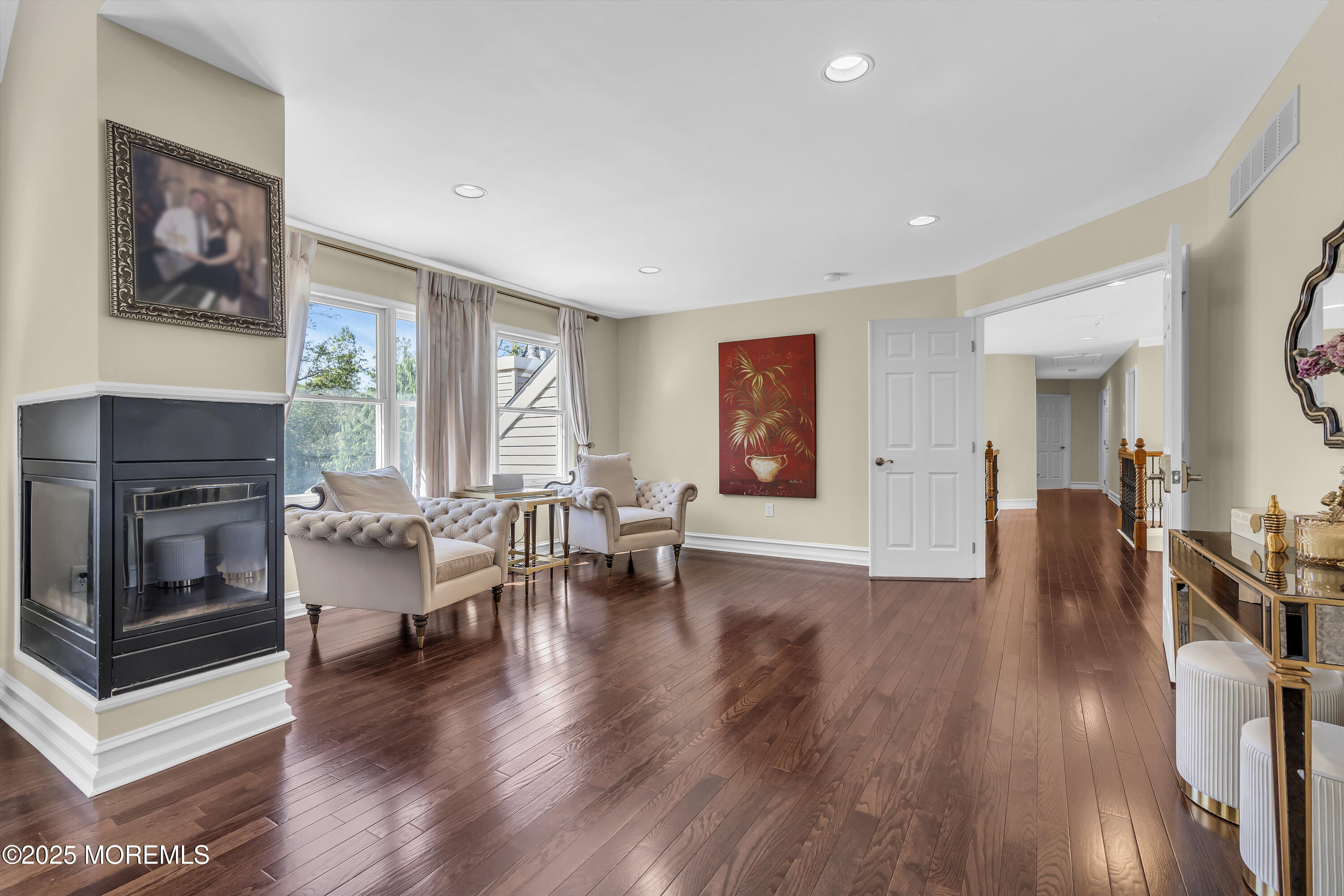1 Fountayne Lane Manalapan, NJ 07726 - Photo 45 of 69 a living room with furniture and a fireplace