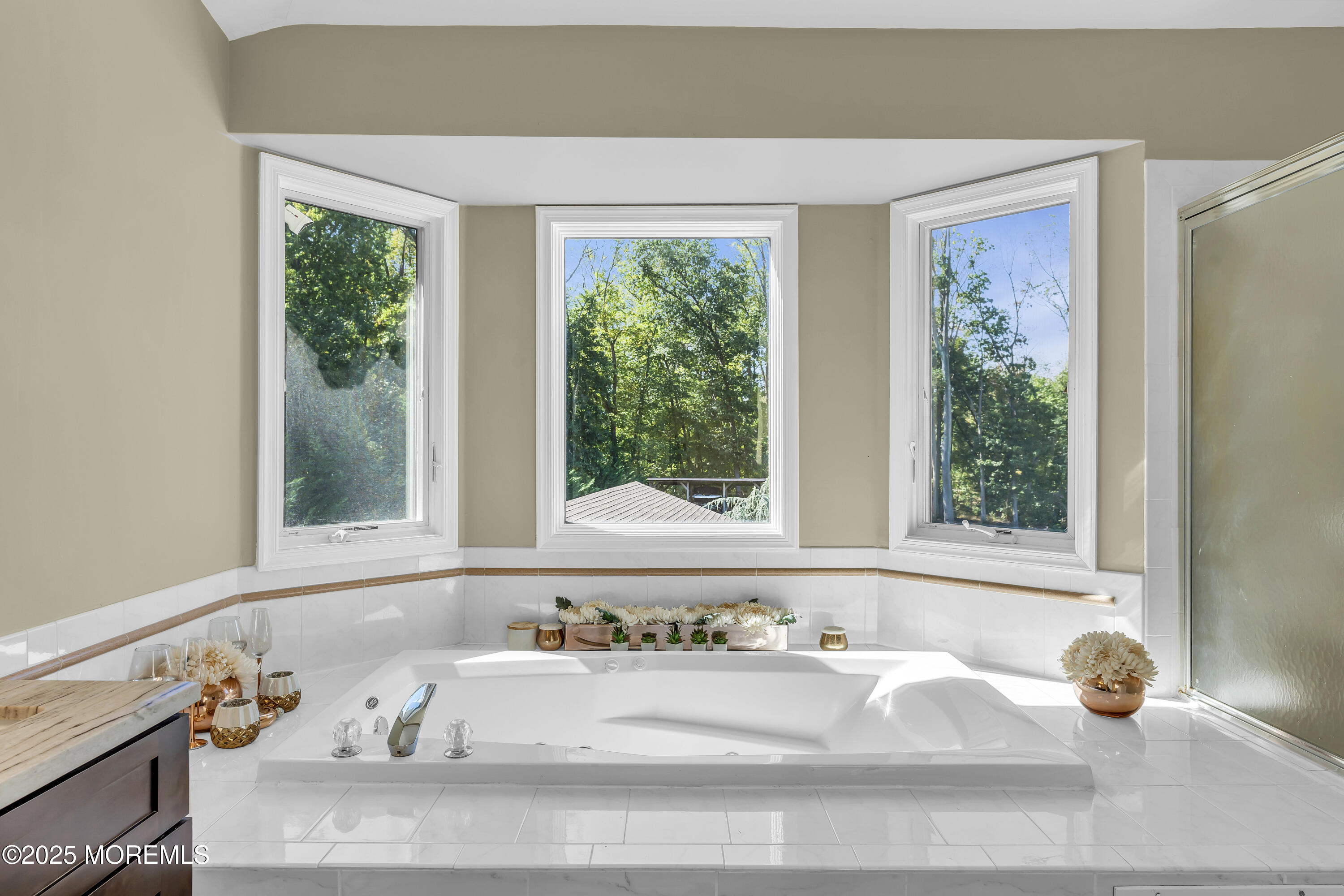 1 Fountayne Lane Manalapan, NJ 07726 - Photo 49 of 69 a bathroom with a tub and a window