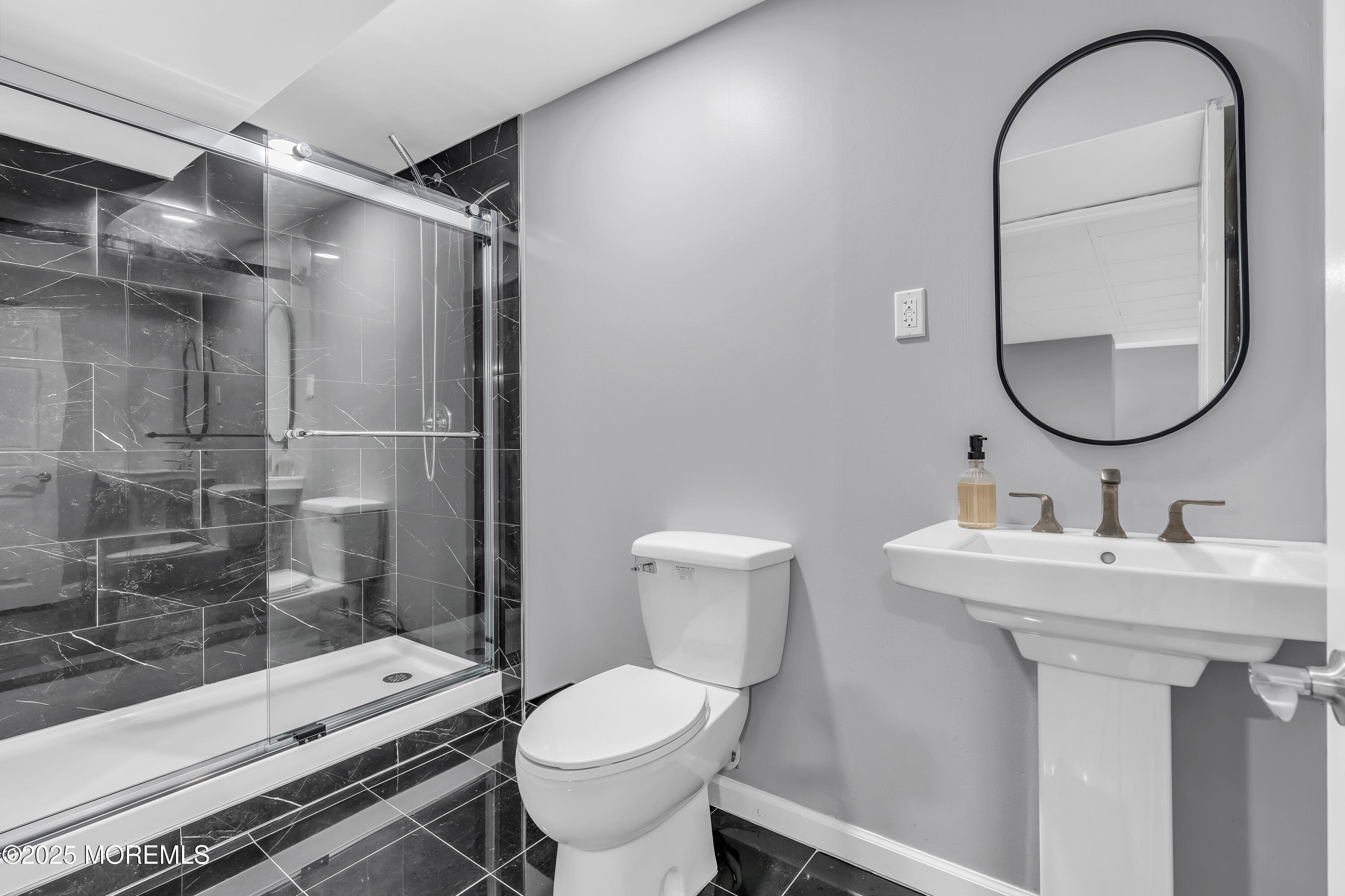 1 Fountayne Lane Manalapan, NJ 07726 - Photo 66 of 69 a bathroom with a sink toilet and shower