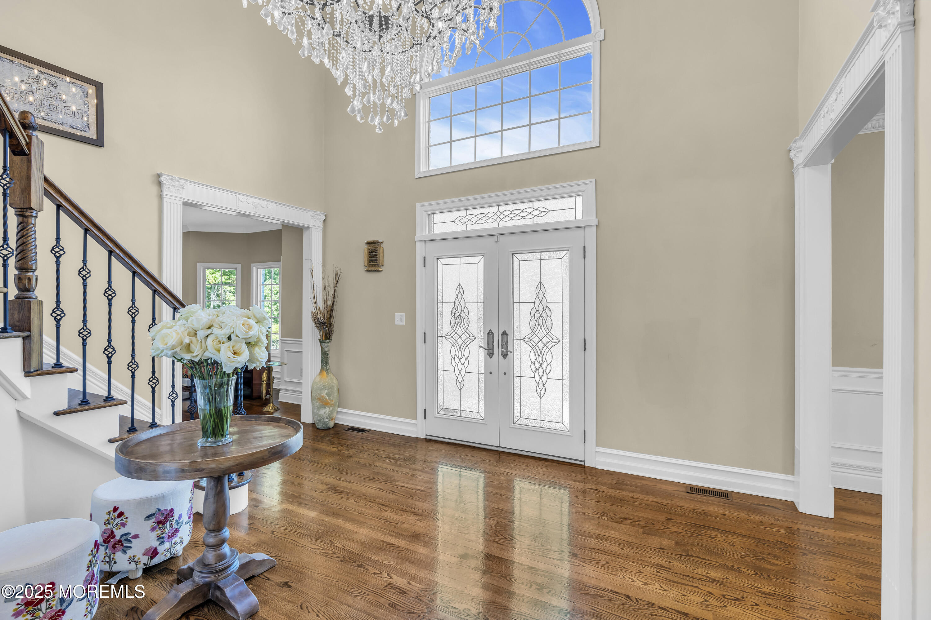 1 Fountayne Lane Manalapan, NJ 07726 - Photo 8 of 69 a view of a livingroom with furniture fire place and wooden floor