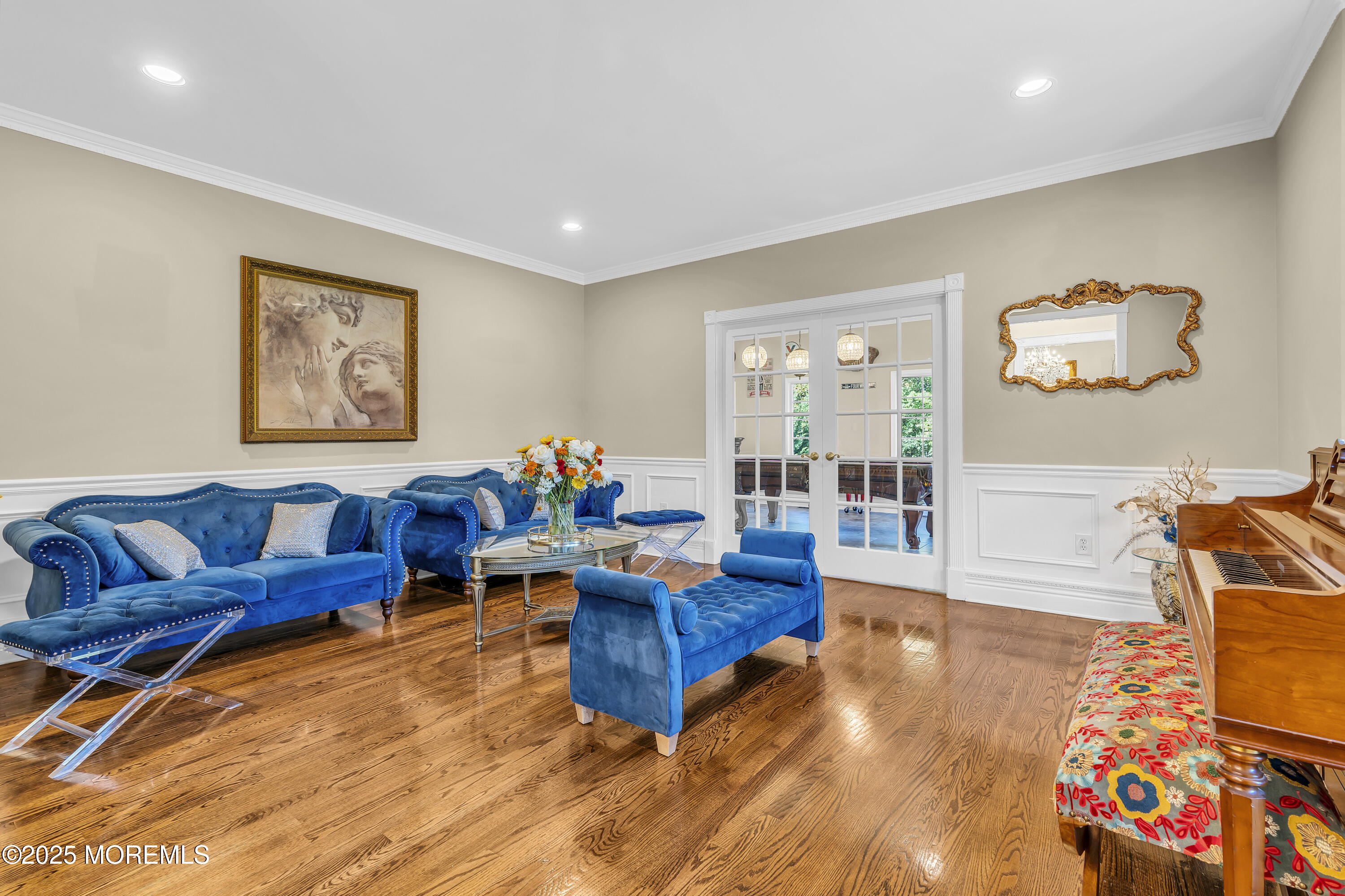 1 Fountayne Lane Manalapan, NJ 07726 - Photo 9 of 69 a living room with furniture and a flat screen tv