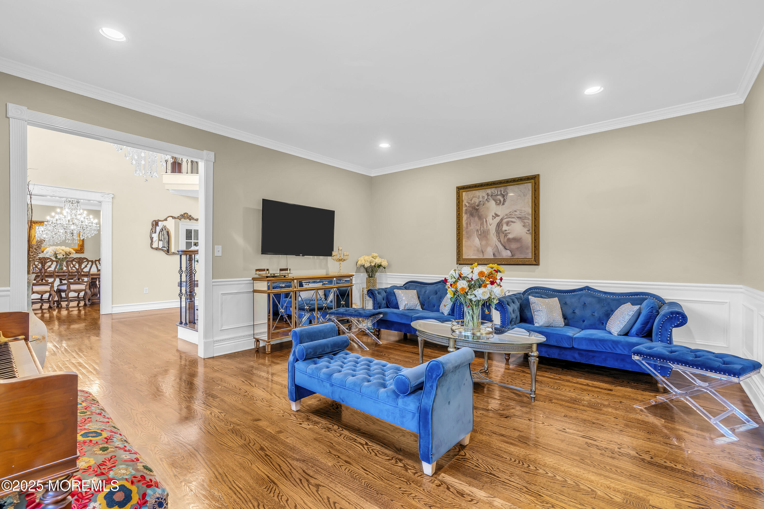 1 Fountayne Lane Manalapan, NJ 07726 - Photo 10 of 69 a living room with furniture and a flat screen tv