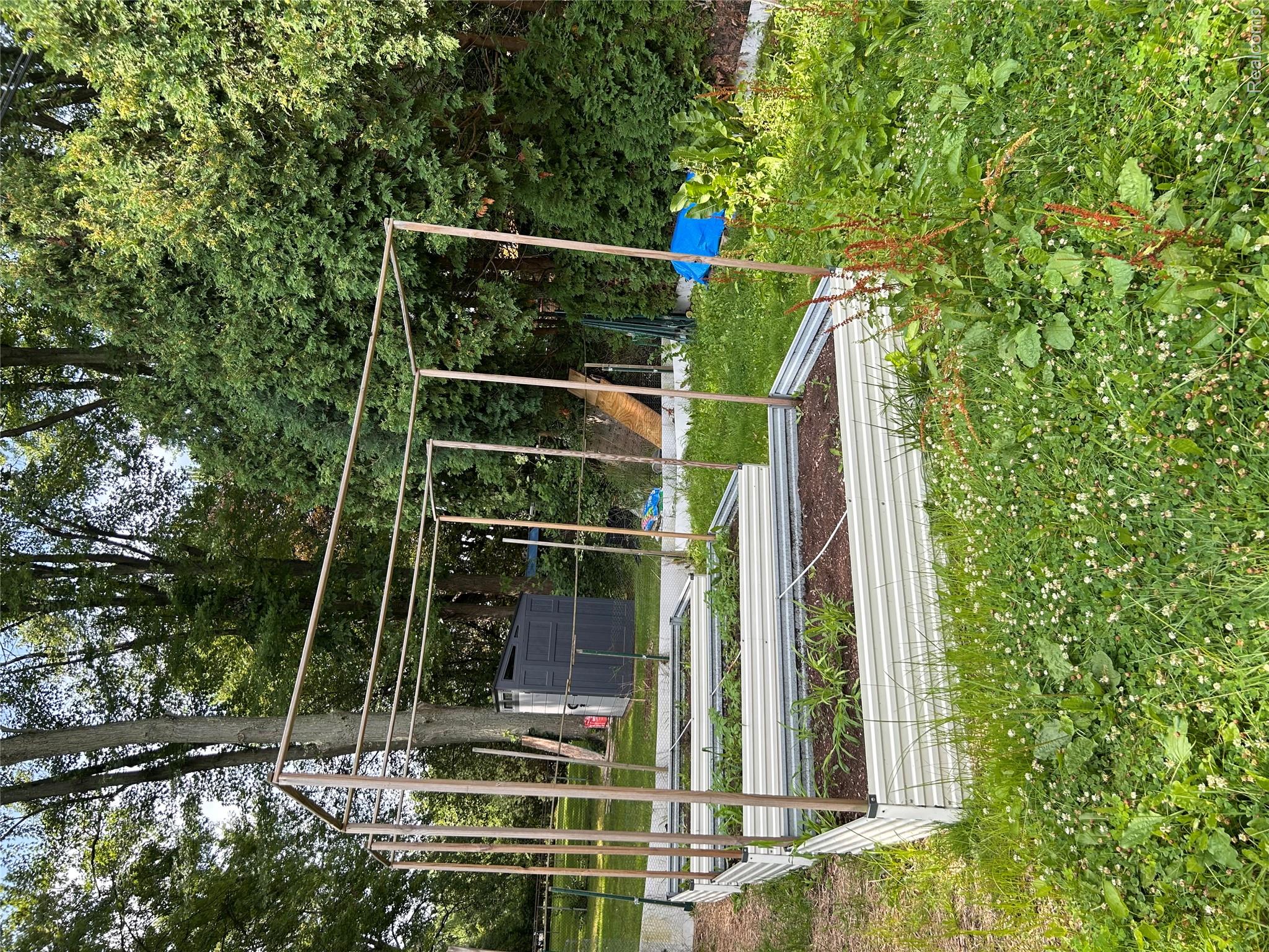 340 Trombley Road Troy, MI 48083 - Photo 17 of 17 garden with raised beds.jpeg