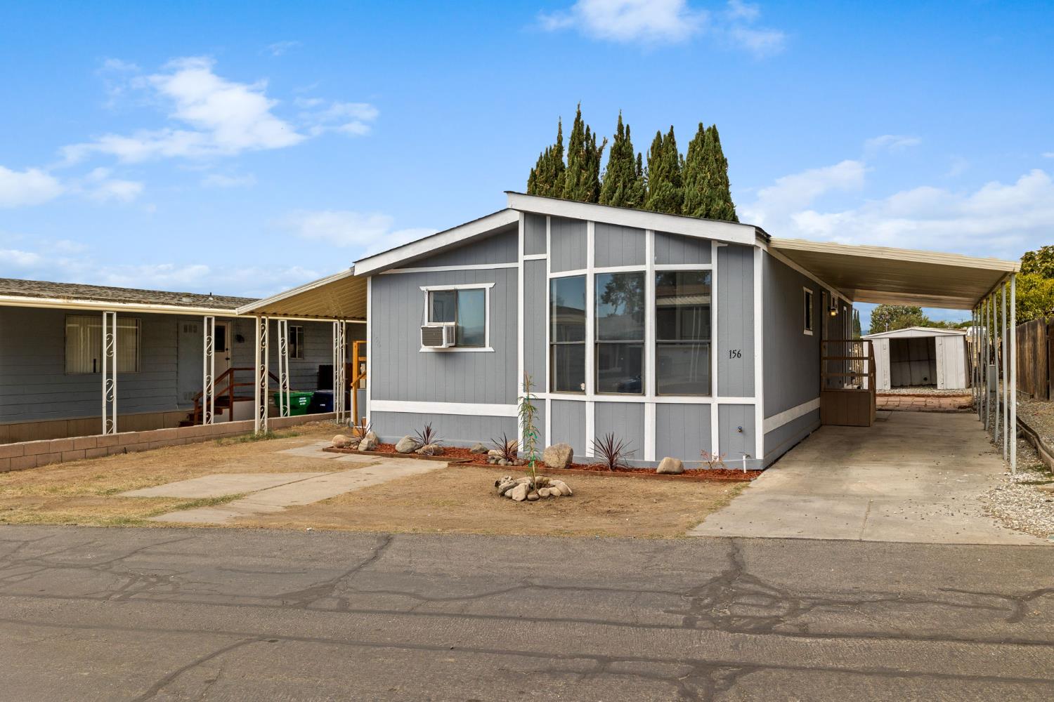 8300 Kern Canyon Road, Unit 156 Bakersfield, CA 93306 - Photo 2 of 40 a view of a house with a outdoor space